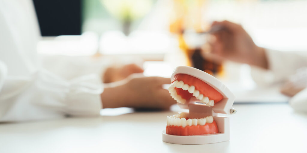 dentist talking with patient